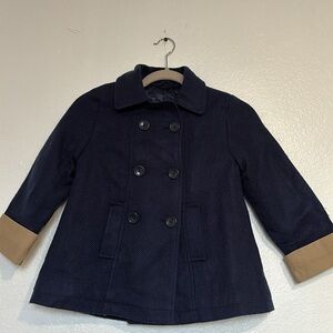Girl's coat size 6 in navy blue with beige trim
